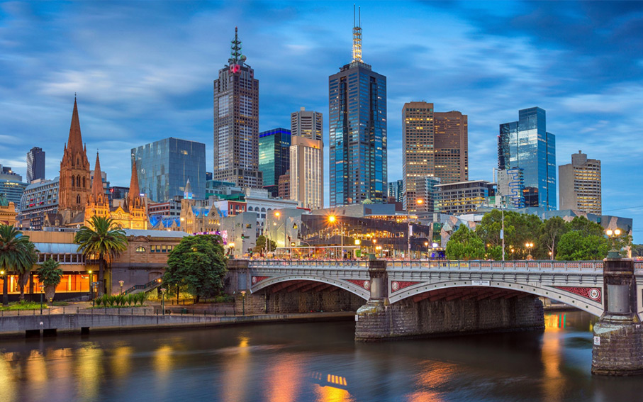 An Australian city skyline under a dramatic sky