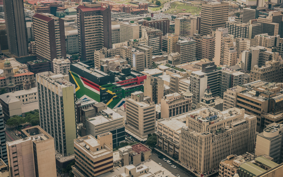 An aerial view over a dense South African city centre