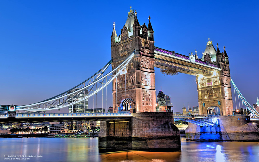 Tower Bridge lit up at dusk